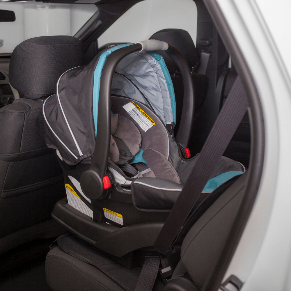 kidtastic rear-facing baby car seat in car